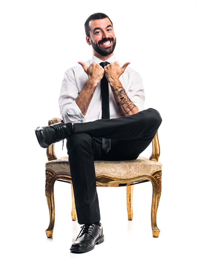 Man sitting on a chair showing double thumbs up