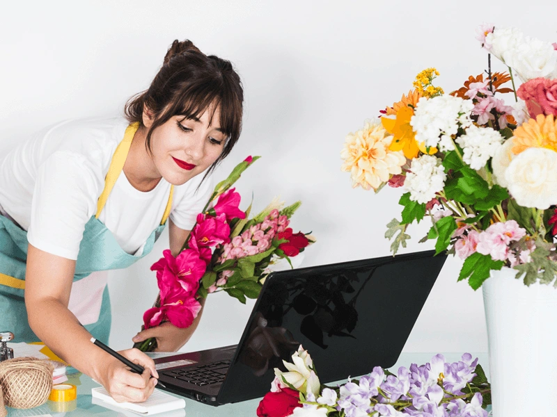 flower arranger in a florists shop