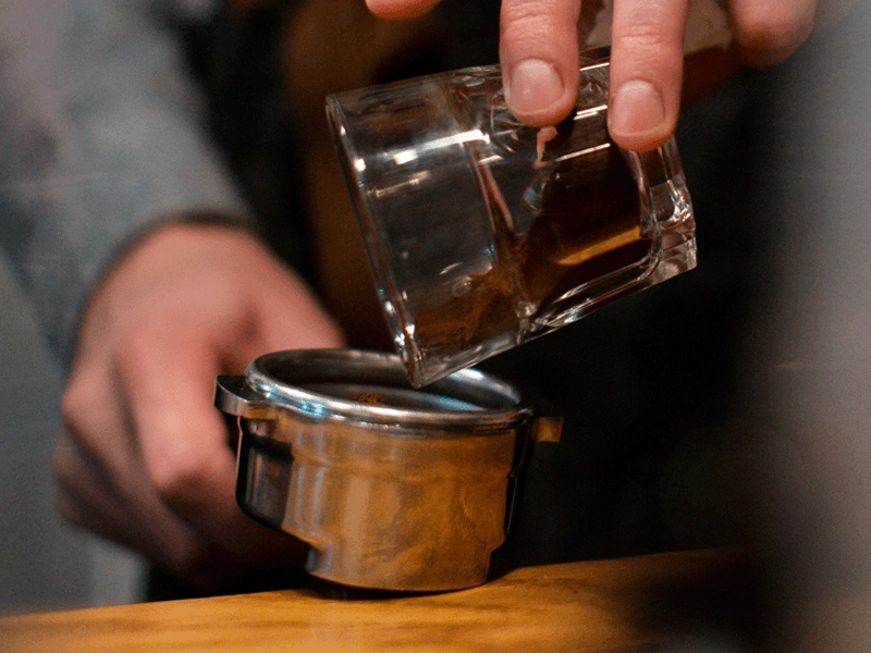 Pouring a coffee into a shot glass